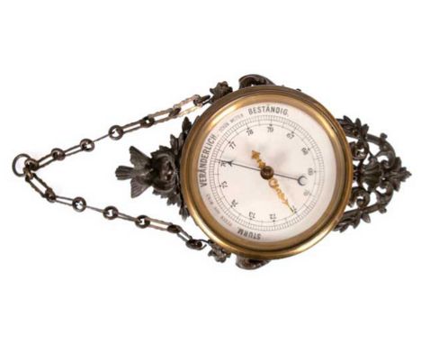 Historismus-Barometer, Messinggehäuse, reliefierte und figürliche Metallverzierungen, an einer Kette, Gebrauchspuren, H. 45 c