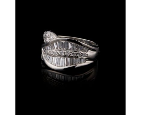 A ringGold 800/000Set with baguette cut diamonds and 21 brilliant cut diamonds totalling approximately 0,85 ct.Oporto hallmar