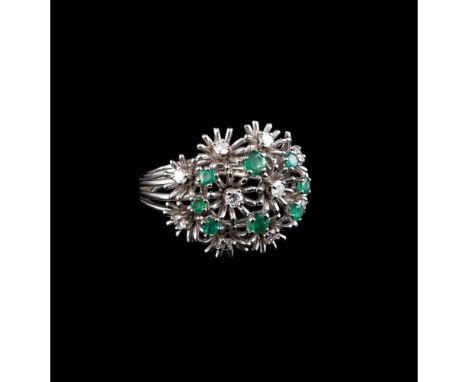 A ringGoldSet with eight emeralds and 10 brilliant cut diamonds totalling approximately 0,80 ct.Mid-20th centuryUnmarked(sign