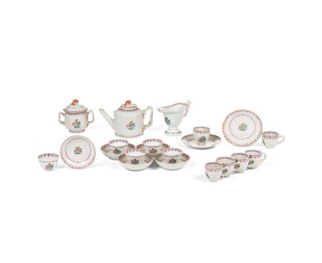 An unusual toy part tea setComprising of teapot and cover, sugar bowl and cover, milk jug, seven saucers, five cups and six c