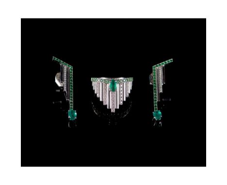 A MONSEO ring and pair of earringsGold 800/000Set with round cut and three oval cut emeralds and 50 brilliant cut diamonds to