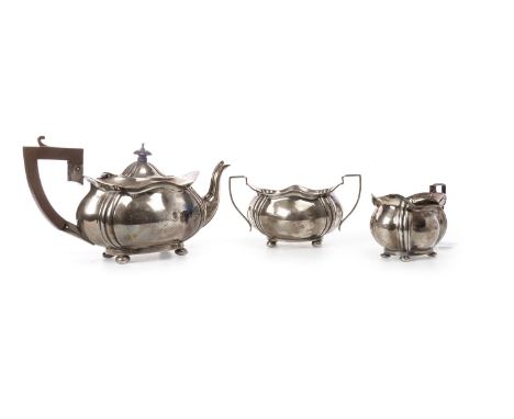 ART DECO SILVER THREE PIECE TEA SERVICE, maker Duncan & Scobbie, Birmingham 1938, comprising teapot, sugar and cream, each of