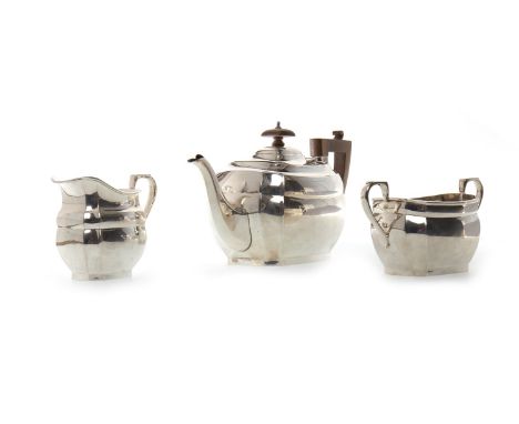 GEORGE V SILVER ART DECO THREE PIECE TEA SERVICE, maker Robert Stewart, Birmingham 1933, of square faceted form, comprising t