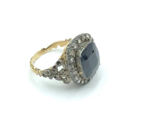 C19th Sapphire &amp; diamond ring. Central cushion cut sapphire 12mm x 10 mm (approx) surrounded by 20 rose cut diamonds with