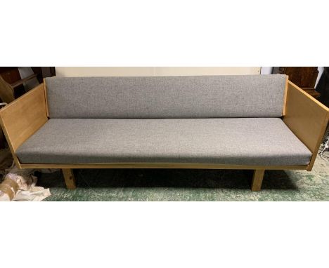 Contemporary light oak Scandinavian style sofa with upholstered seat and back, with an adjustable hinged back 