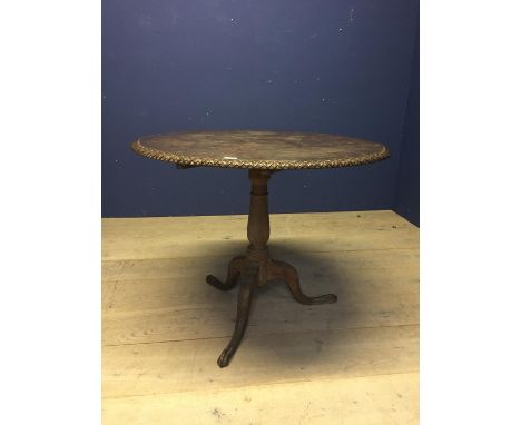 C19th Oak circular pedestal table, the tilt top with carved edging &amp; carved tripod legs &amp; feet 88 cm dia 