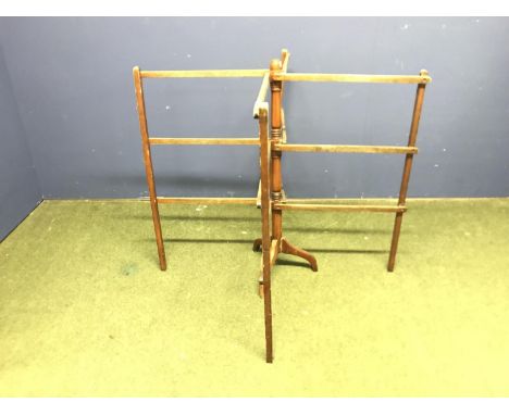 Four armed towel rail, with a tripod central support 
