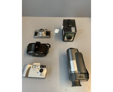 Cameras: Sanyo cine camera, Casio, Kodak Relex &amp; Captain (127mm) 