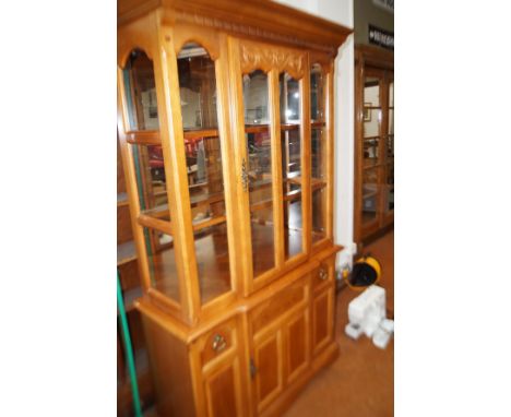 Light wood display cabinet with lights 