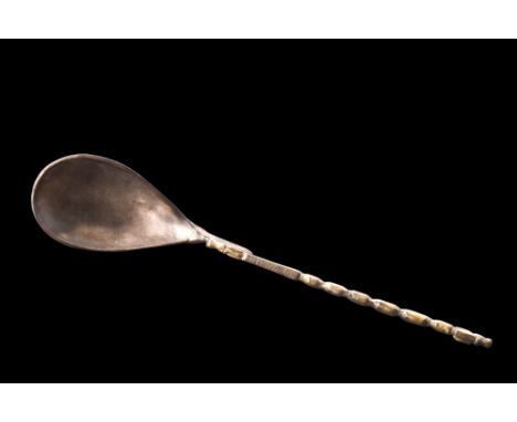 Ca. 100-300 AD.A silver ligula spoon with a stunning pear-shaped bowl gracefully joined with a slender, exquisitely detailed 