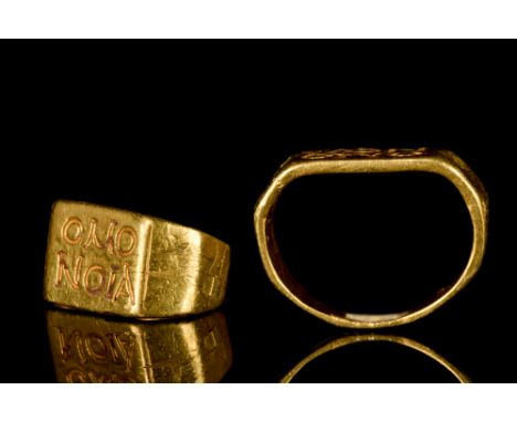 Ca. 400-600 AD.A faceted broad flat-section hoop engraved on the widest part with the Greek inscription, 'OMONOIA' (harmony),