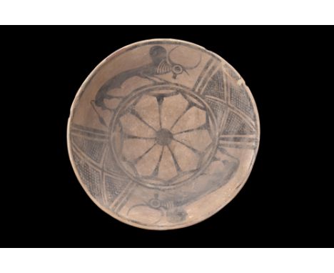 Ca. 3000-2500 BC.A terracotta bowl with its generous size and flaring, deep body resting upon a flat base. While the exterior