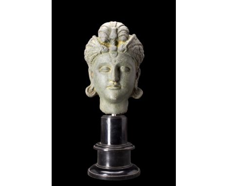 Ca. 200-300 AD.A schist head of the bodhisattva. Carved from schist, the head exhibits meticulous craftsmanship and attention
