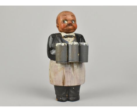 A Novelty Painted Black Forest Corkscrew in the Form of a Bartender with Three Steins of Lager, Hand Painted, 14cms High