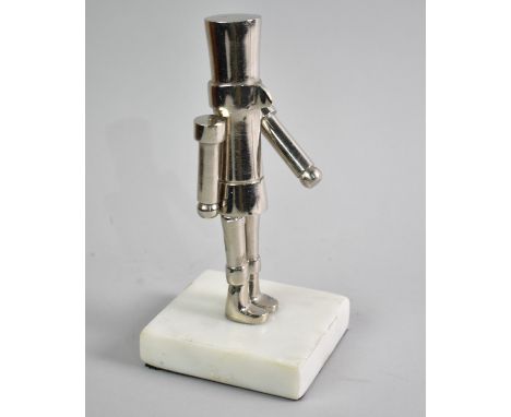 A Contemporary Nutcracker Soldiers on Faux Marble Base, 18.5cms High