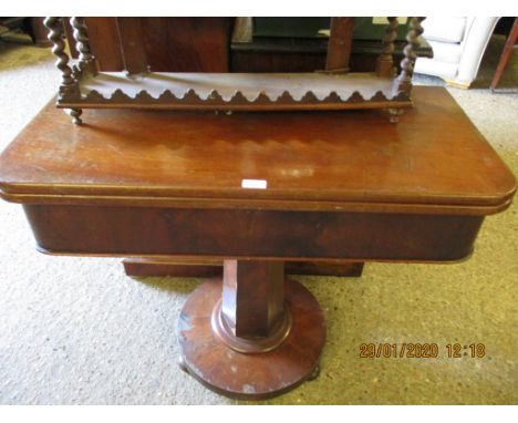 VICTORIAN MAHOGANY FOLD OVER CARD TABLE WITH CANTED COLUMN AND CIRCULAR BASE