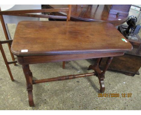 EDWARDIAN WALNUT FOLD OVER CARD TABLE ON RING TURNED SUPPORTS