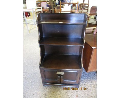 DARK STAINED POSSIBLY ERCOL WATERFALL FRONT BOOKCASE WITH TWO CUPBOARD DOORS WITH TURNED HANDLES
