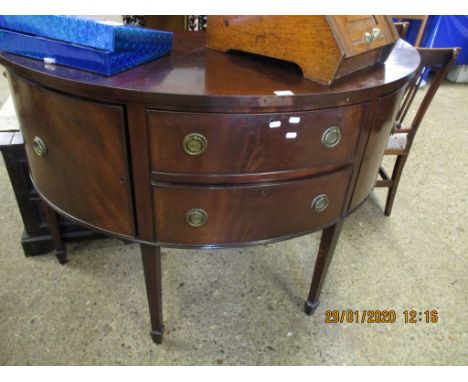 MAHOGANY BOW FRONTED SIDEBOARD FITTED CENTRALLY WITH TWO DRAWERS FLANKED EITHER SIDE BY CUPBOARD WITH RINGLET HANDLES