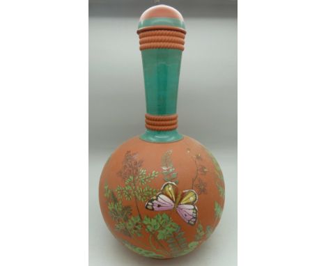 A terracotta lidded vase with enamel decoration, lid a/f, height 24.6cm