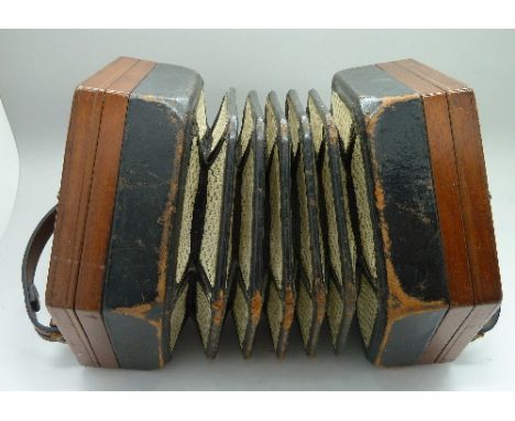 An early 20th Century hand accordion, marked Steel Reeds