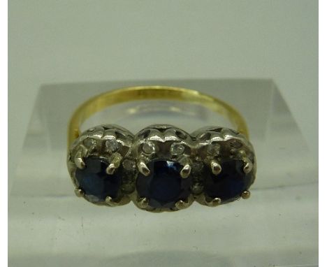 An 18ct gold, diamond and sapphire ring, weight 3.8g, size K