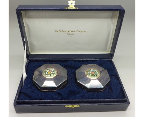 A pair of silver and enamel trinket pots by St. James House Co., both depicting parrots, octagonal, width 63mm, total weight 