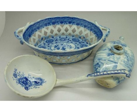 A pierced blue and white basket, a ladle and baby feeder, basket a/f