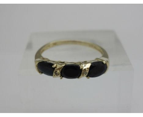 A 9ct gold, sapphire and diamond ring, weight 1.5g, size O