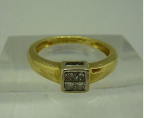 An 18ct gold and four stone diamond ring, weight 2.9g, size N