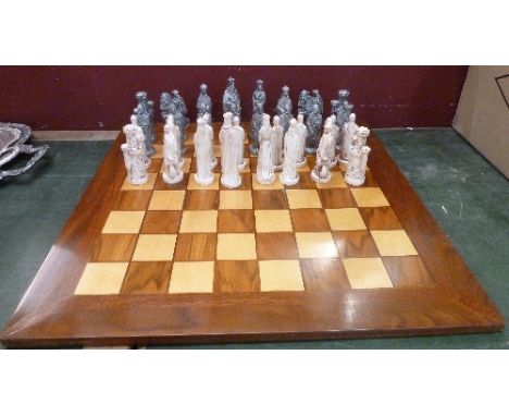 A chess board and pieces