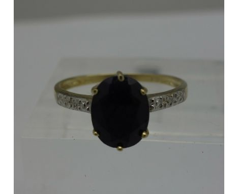 A 9ct gold, sapphire and diamond ring, weight 1.6g, size O