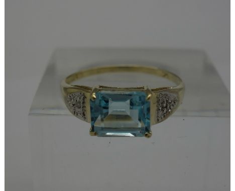 A 9ct gold, blue stone and diamond ring, weight 1.7g, size O