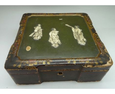 A Meiji period Japanese lacquered box decorated with three Geisha girls and chess pieces, a/f