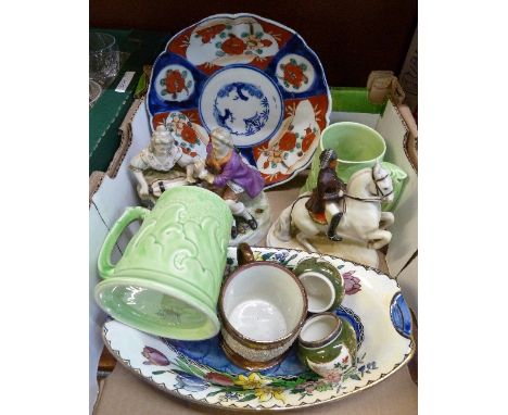 A collection of pottery and china including a Goebel figure of a horse and rider, a lustre mug, etc.