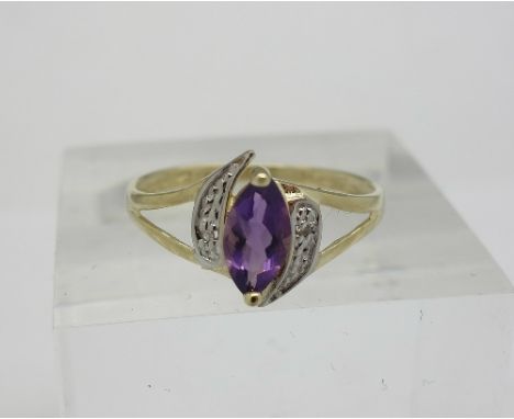 A 9ct gold, diamond and amethyst ring, weight 1.1g, size N