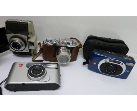 Two Leica cameras, Z2X Vario-Elmar 35-70 and Vario-Elmar 38-105 ASPH, a Kodak camera and a Halina camera