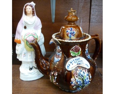 A 19th Century Staffordshire figure and bargeware teapot, a/f, teapot marked To Mr & Mrs J. Smylie, Derby