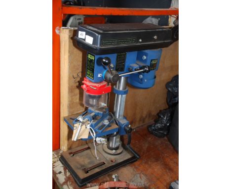 A small Powercraft bench mounted Pillar Drill with 2 1/2'' clamp vice.