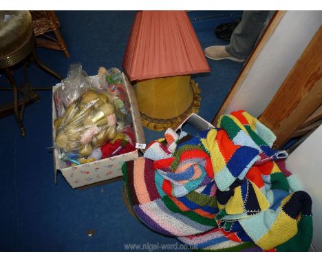 A quantity of lamp shades, knitting wool and two knitted patchwork throws.