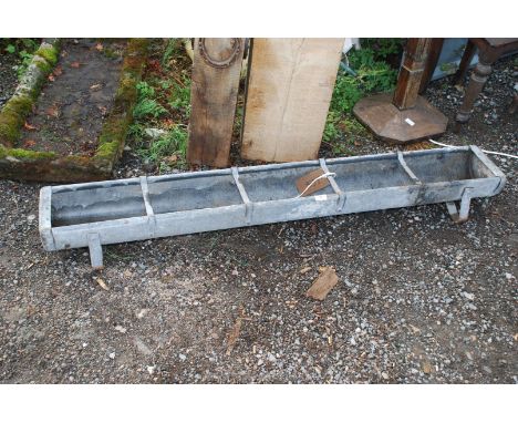 A galvanised feed trough, 5' long.