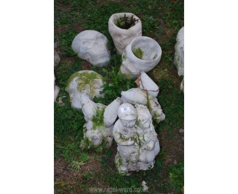 A quantity of concrete garden ornaments including skull, gargoyle, etc. 