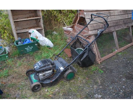 A Trojan 18sls45, Briggs &amp; Stratton engine petrol mower with grass box, good compression.