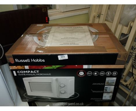 A Russell Hobbs 800 watt compact Microwave.
