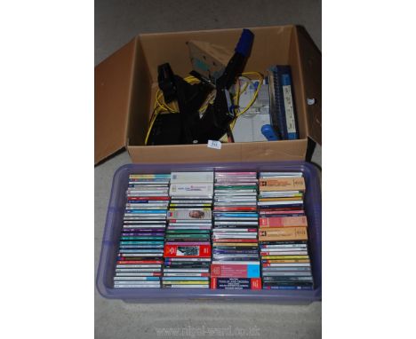 A box of miscellaneous cd's, office equipment, industrial stapler, etc.