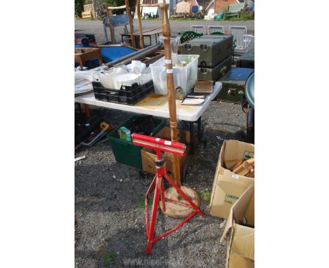 An adjustable roller stand and standard lamp base.