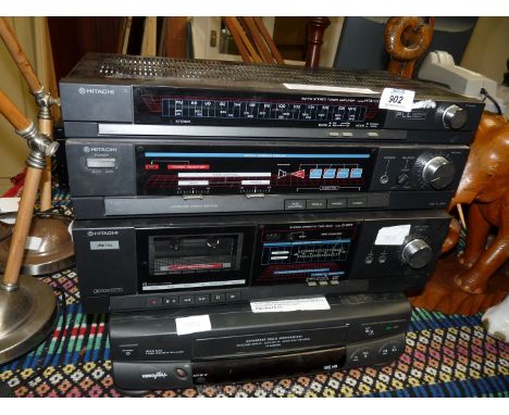 Two Hitachi amplifiers and a Goodmans VHS player.