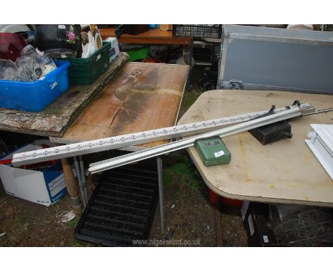 A Cowley automatic Level, with tripod and aluminium surveyor's staff.
