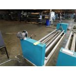 Unwind cradle with idlers rolls 124”long 18”diameter. Motorized and Air Aliment, Rigging Fee: $100