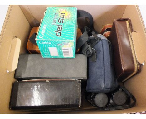 Four pairs of binoculars including Tasco, Minolta, Asahi Pentax camera etc